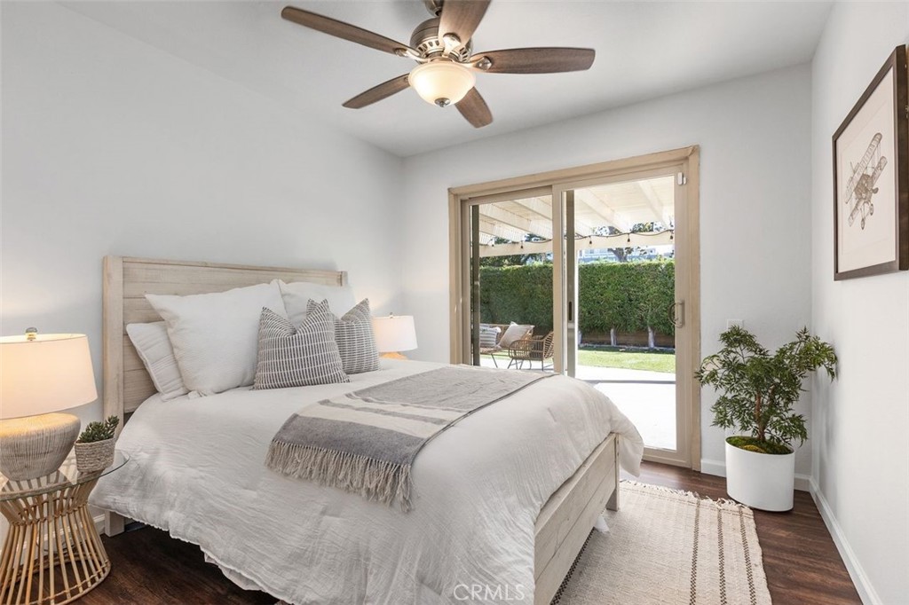 Guest bedroom #2 has views and a slider opening to the backyard. - 24832 El Cortijo, Mission Viejo CA 92691 - photo 15