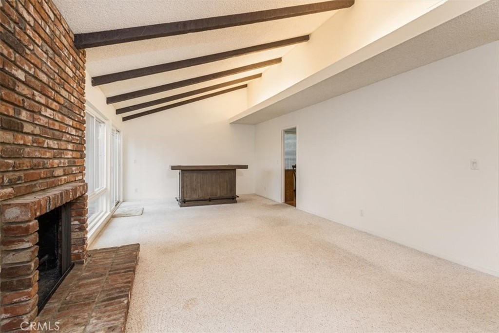 Family Room & Fireplace Looking to Dining Room - 25415 Remesa, Mission Viejo CA 92691 - photo 8