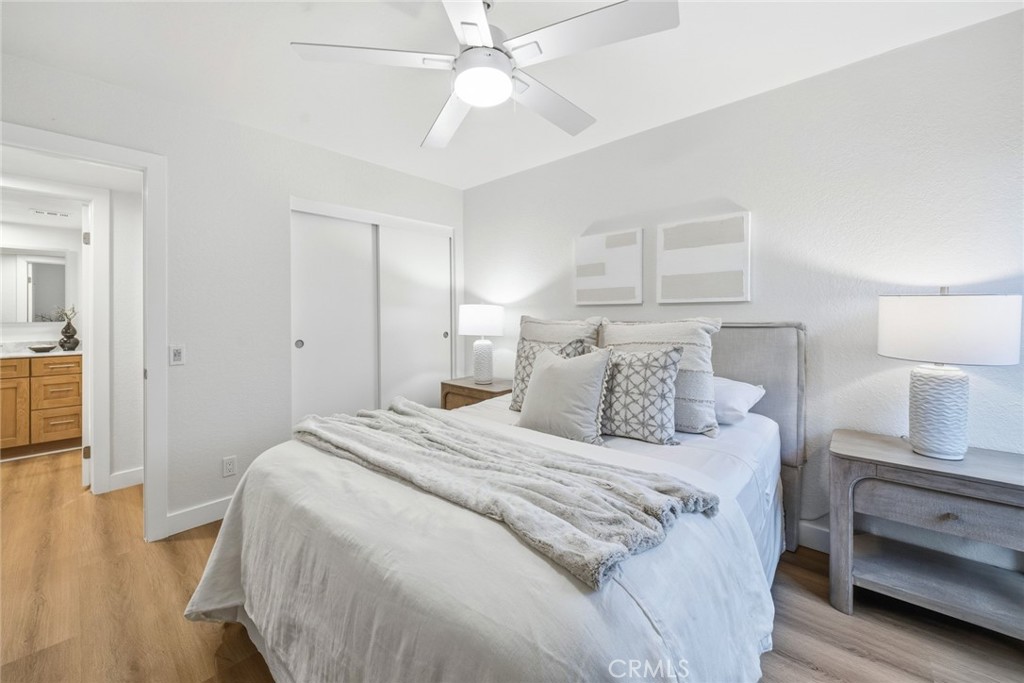 Bedroom, view toward the bed and doorway. - 25911 Blascos 102, Mission Viejo CA 92691 - photo 22