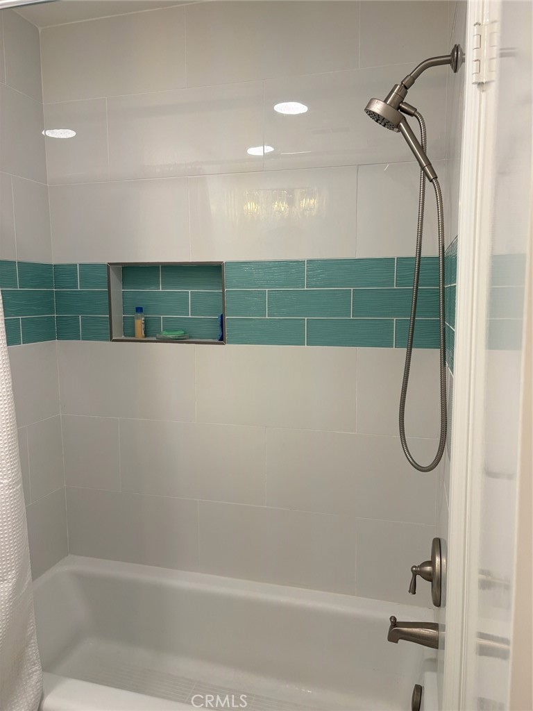 Bathtub & shower in 2nd bathroom - 26121 La Real # 6F, Mission Viejo CA 92691 - photo 21