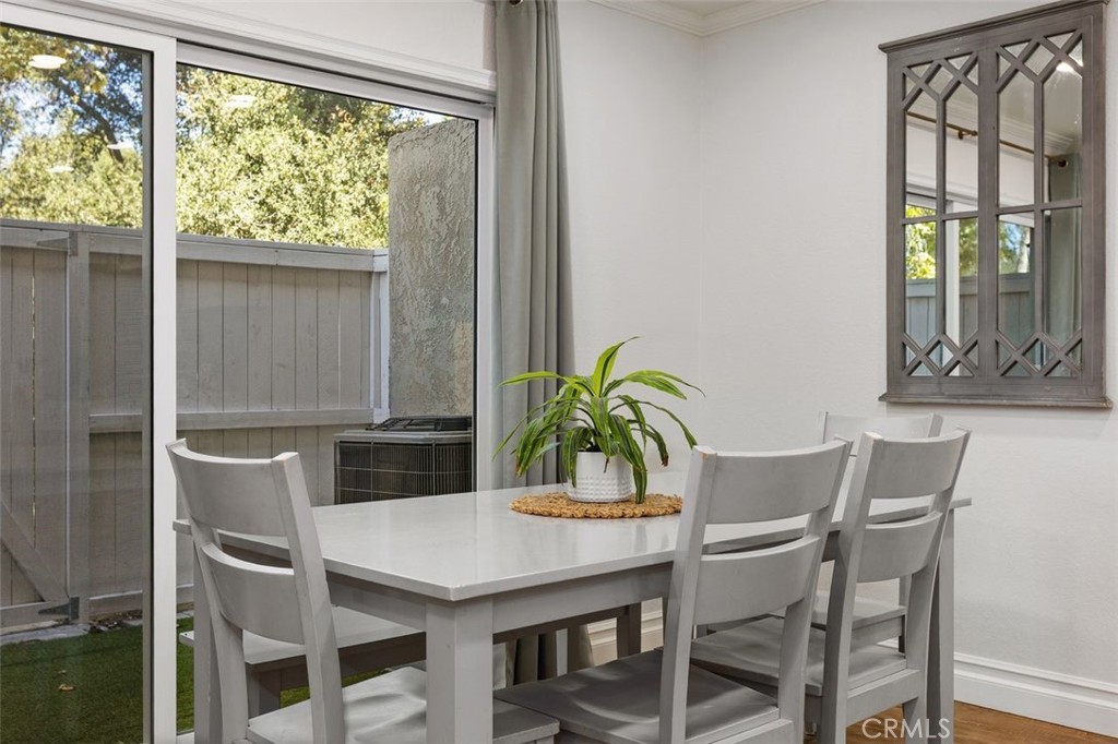 Light and bright dining area next to the newer sliding door leading out to the patio. - 26495 Via Damasco, Mission Viejo CA 92691 - photo 9