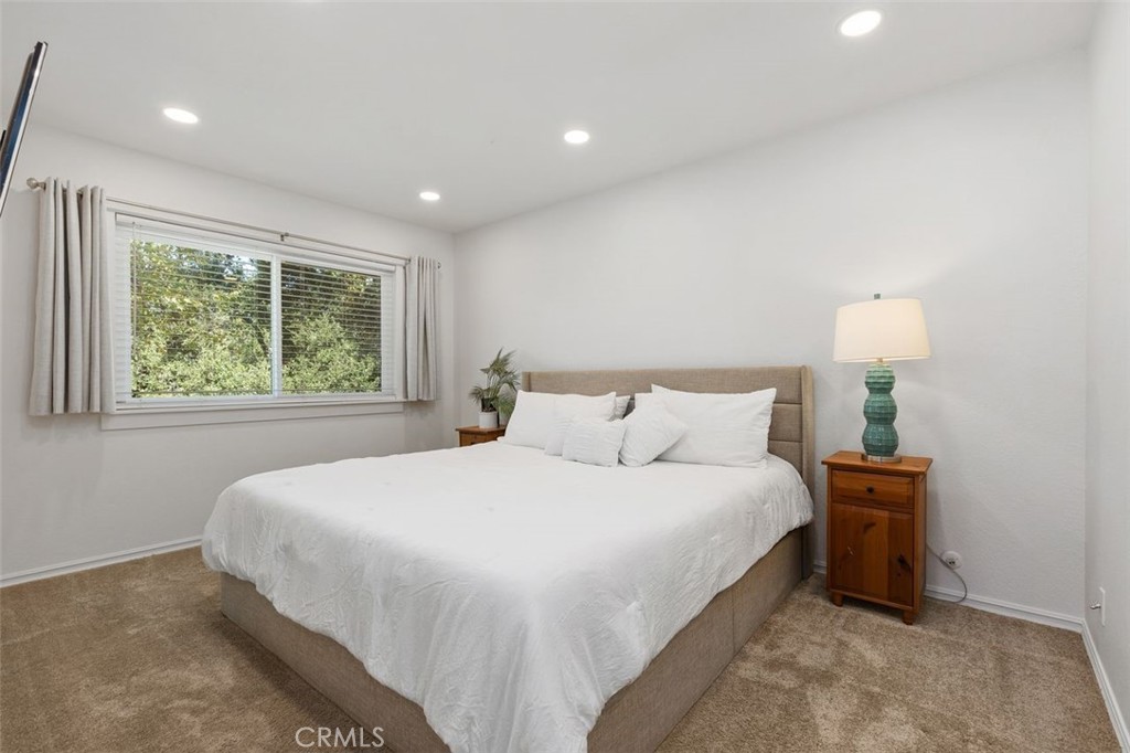 Primary Bedroom Upstairs with Views of the Woods - 26495 Via Damasco, Mission Viejo CA 92691 - photo 13
