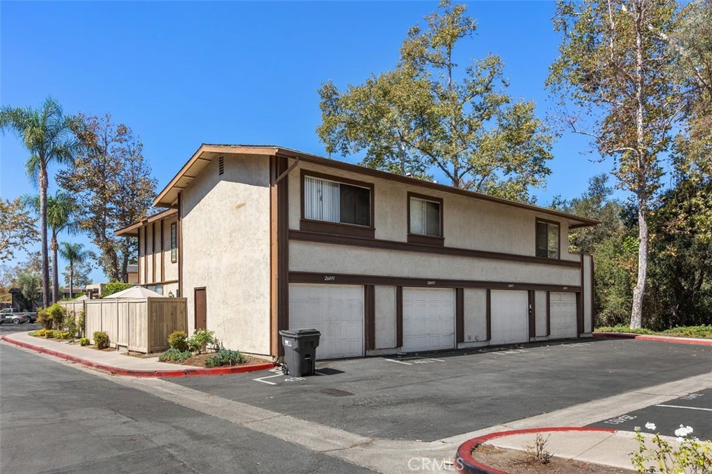 Condos showing attached garages. - 26495 Via Damasco, Mission Viejo CA 92691 - photo 18