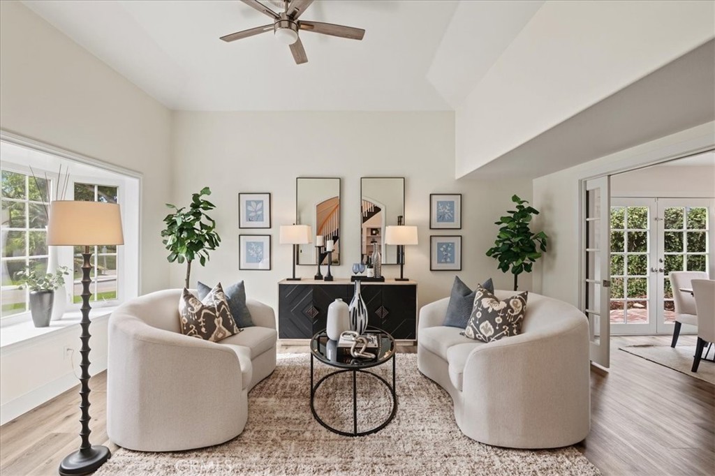 Take a comfortable seat and enjoy the views out of the front bay window or look past the French Mullioned Pocket Doors i - 26515 Via Del Sol, Mission Viejo CA 92691 - photo 7