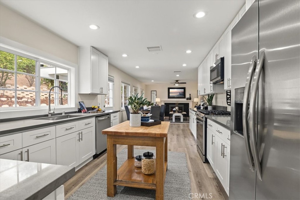 This is a completely Brand New Kitchen with all new cabinetry, appliances, and Quartz countertops that offer endless are - 26515 Via Del Sol, Mission Viejo CA 92691 - photo 12