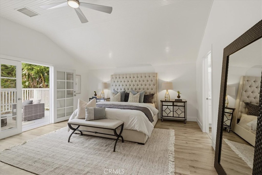 Welcome to the very spacious Primary Bedroom with a dramatic tongue and groove high, angled ceiling. - 26515 Via Del Sol, Mission Viejo CA 92691 - photo 33