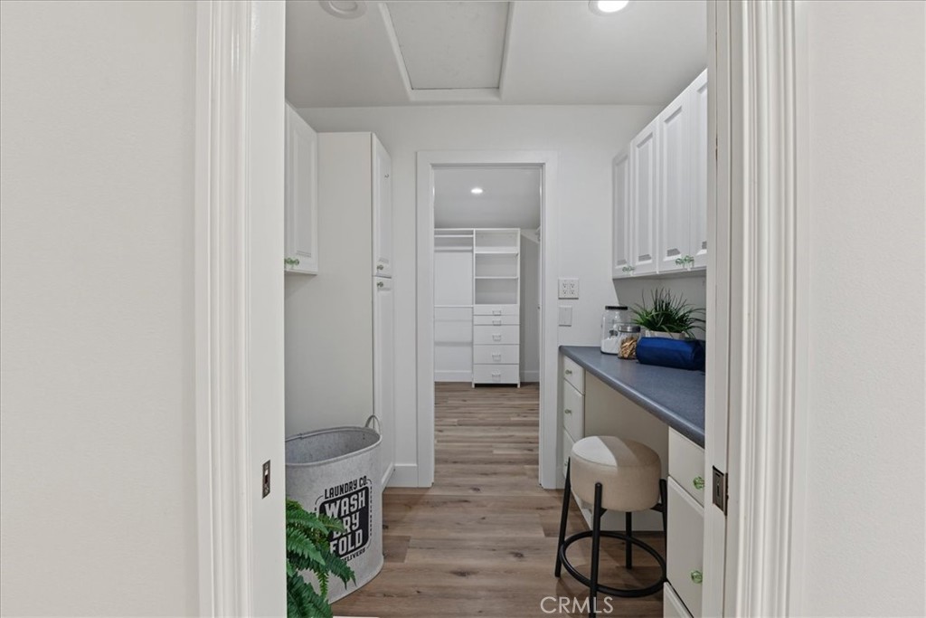 The Upstairs Laundry Room has very convenient Dual Direct Access from both the Primary Walk-in Closet and the Upstairs H - 26515 Via Del Sol, Mission Viejo CA 92691 - photo 45