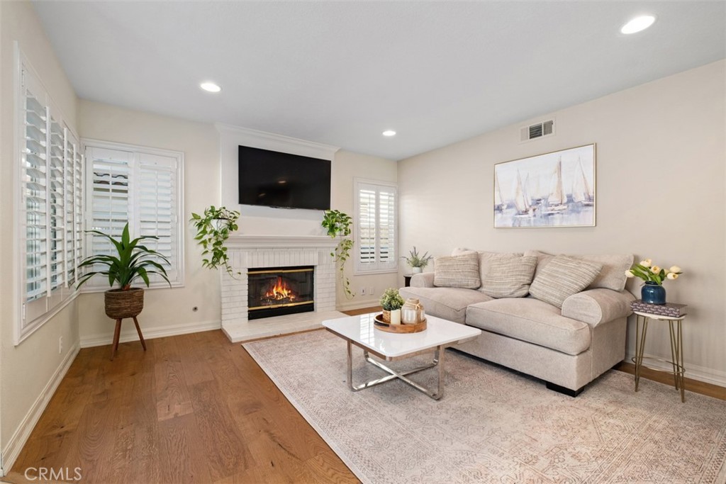family room- fireplace digitally enhanced - 26535 Mikanos, Mission Viejo CA 92692 - photo 9