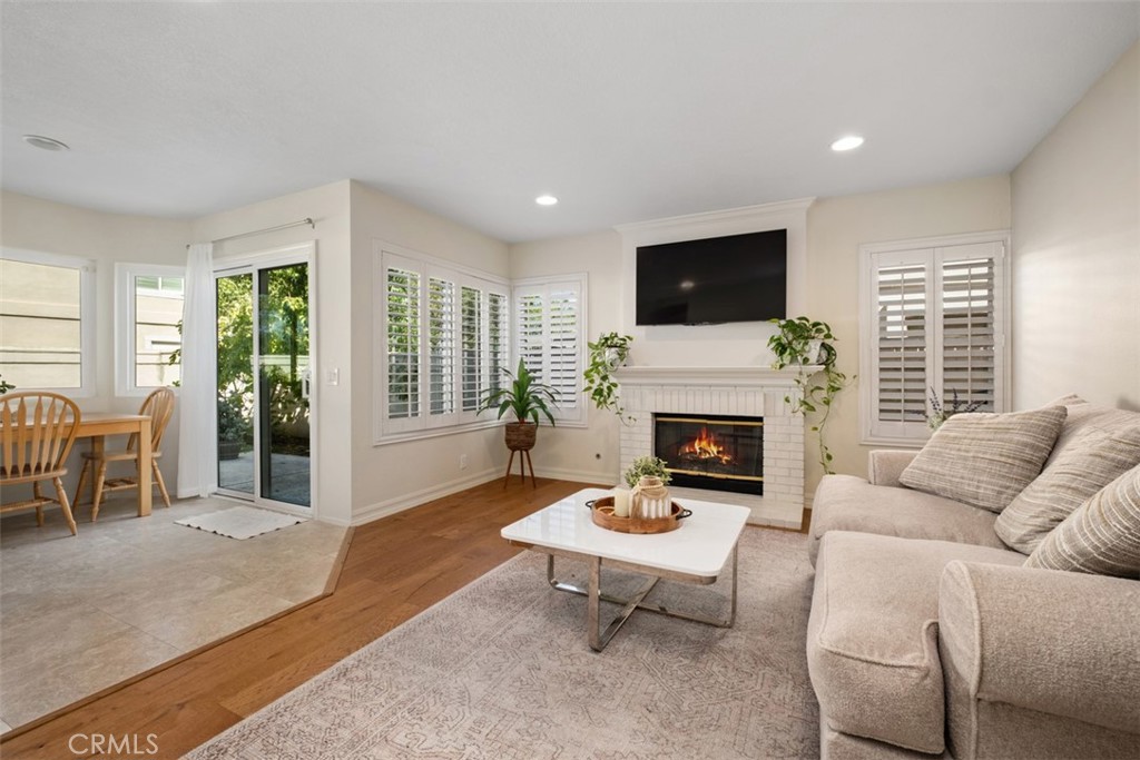 family room-fireplace digitally enhanced - 26535 Mikanos, Mission Viejo CA 92692 - photo 10