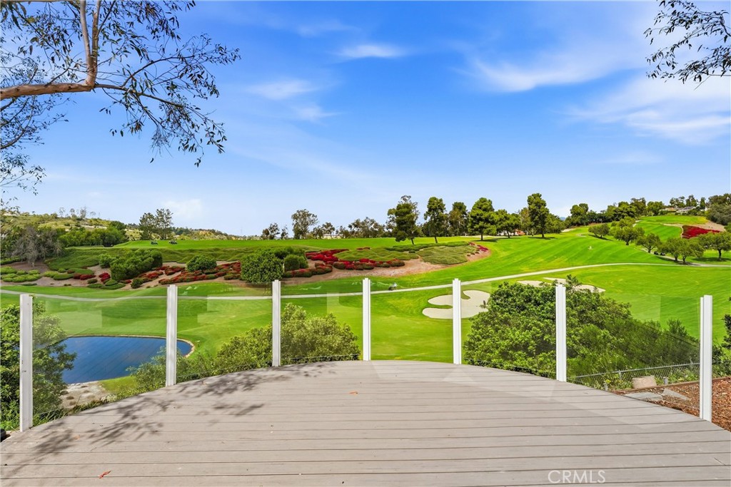 Backyard deck and its view. Full Fairway view and partial water view. - 26925 Via Grande, Mission Viejo CA 92691 - photo 1