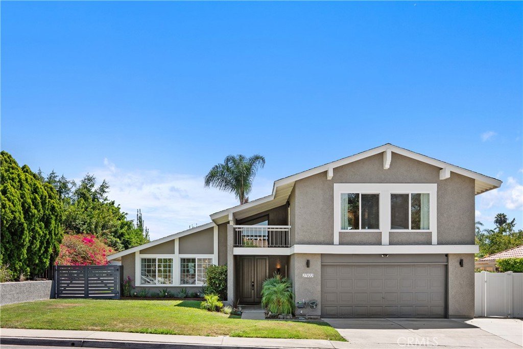 Beautifully landscaped front yard, with sprinklers, drip system, and lighting. - 27022 Mariscal, Mission Viejo CA 92691 - photo 1