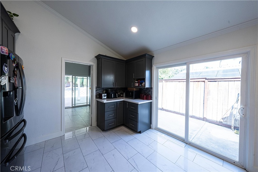 Kitchen & View of Bonus Room - 27081 Sombras, Mission Viejo CA 92692 - photo 10