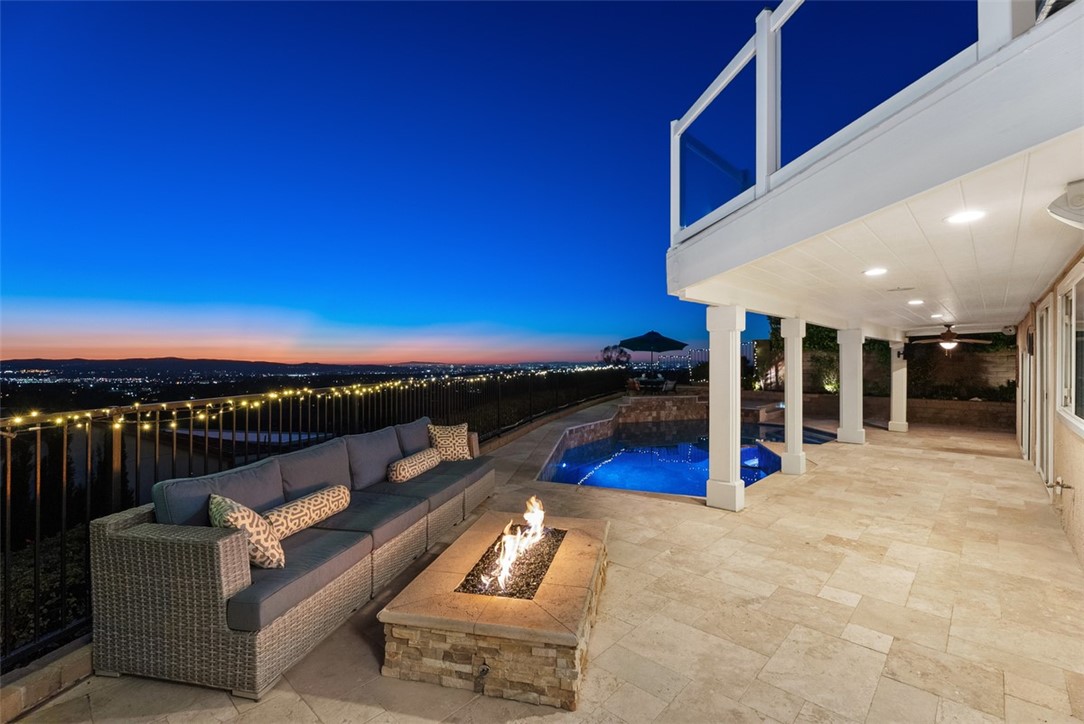 Expansive 270-degree panoramic view that sweeps from the sparkling coast to nightly Laguna Canyon sunsets and even Disne - 27197 Via Aurora, Mission Viejo CA 92691 - photo 1