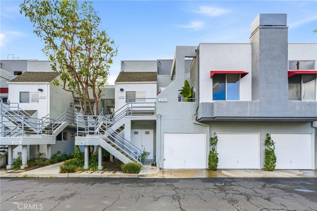 Peaceful surroundings paired with a central Orange County location. - 27743 Zircon 104, Mission Viejo CA 92691 - photo 1