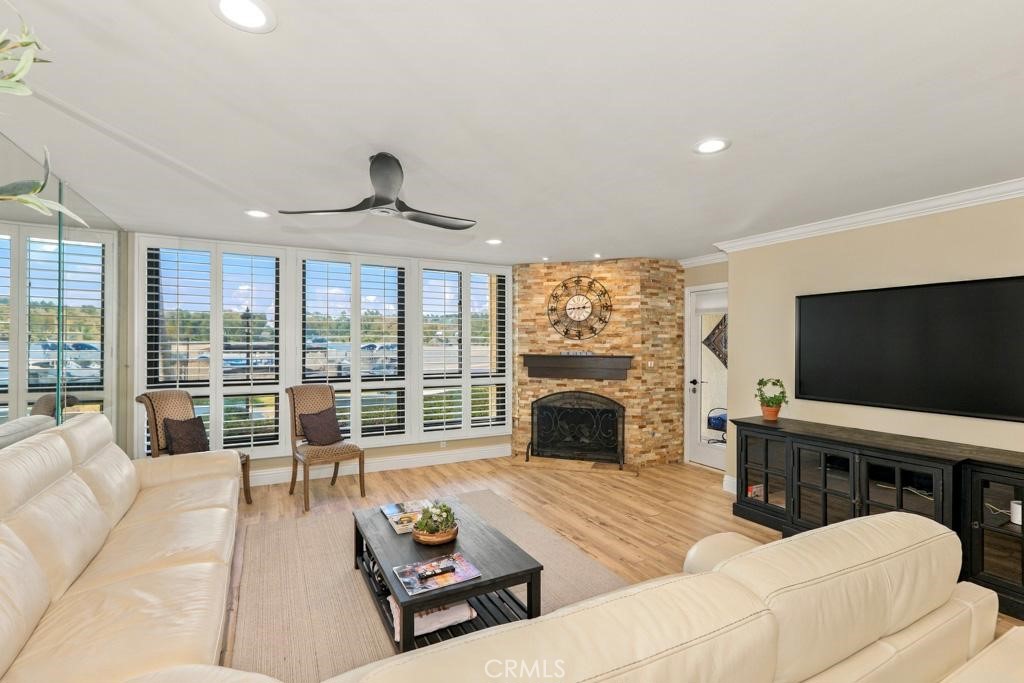 Open living room with lake view - 27805 Barbate 15, Mission Viejo CA 92692 - photo 1