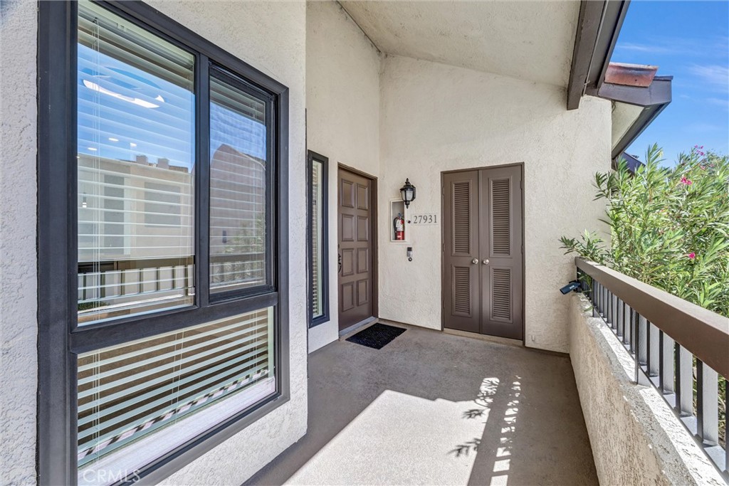 Ground level entrance with easy access to garage and carport - 27931 Trocadero, Mission Viejo CA 92692 - photo 32