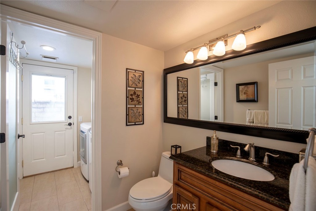 Powder room and indoor laundry room - 28152 Amable, Mission Viejo CA 92692 - photo 12