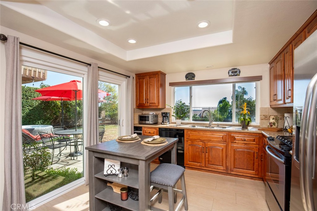 Upgraded kitchen and large picture window and slider - 28152 Amable, Mission Viejo CA 92692 - photo 15