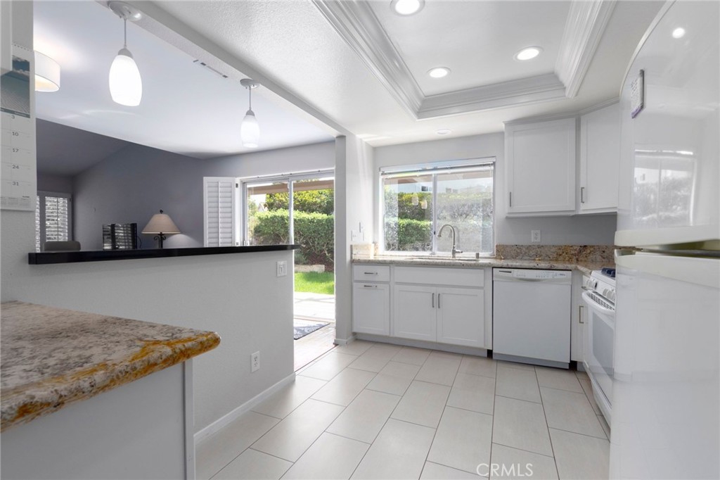 kitchen window with a view of the greenbelt - 28302 Borgona, Mission Viejo CA 92692 - photo 24