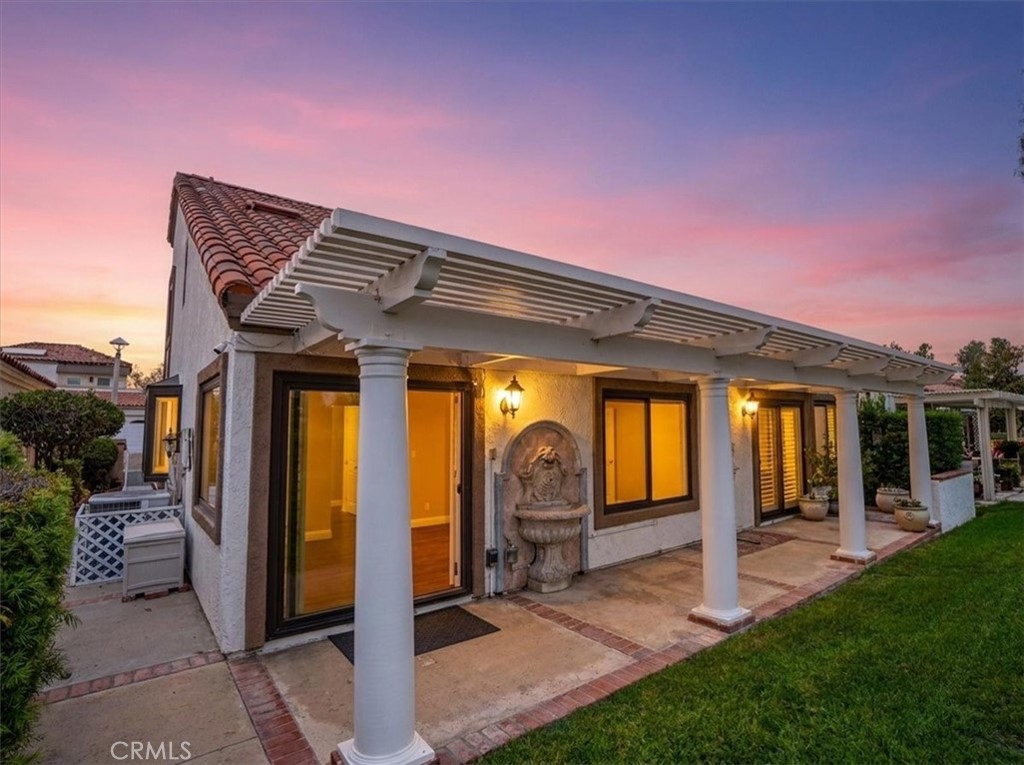 Stunning outdoor living space featuring a spacious, low-maintenance back patio perfect for entertaining and relaxation. - 28391 Borgona, Mission Viejo CA 92692 - photo 3