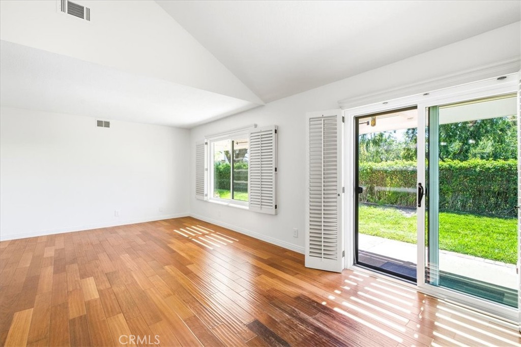 Family Room open to the patio. - 28391 Borgona, Mission Viejo CA 92692 - photo 18
