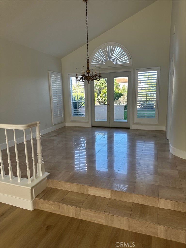 Formal Dining room with French doors leadiang out to backyard - 28451 Fieldbrook, Mission Viejo CA 92692 - photo 5
