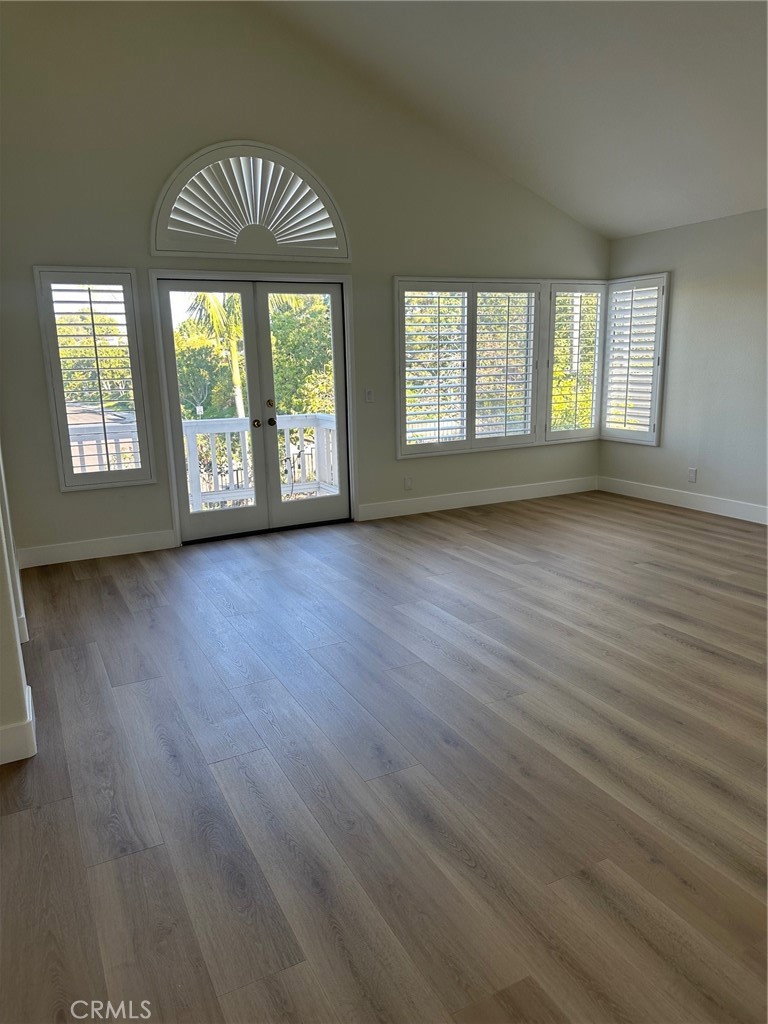 Primary bedroom with French doors leading out to balcony - 28451 Fieldbrook, Mission Viejo CA 92692 - photo 20