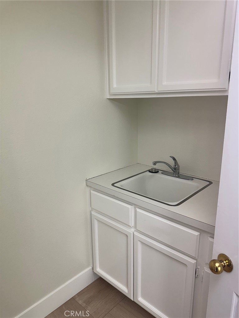 Main floor laundry room with sink - 28451 Fieldbrook, Mission Viejo CA 92692 - photo 32