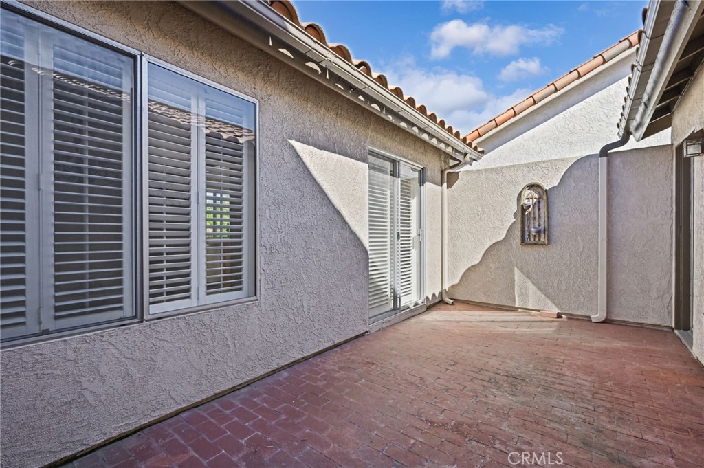 Perfect enclosed patio to keep your small pets safe or for private lounging. This Patio can also be enclosed and added t - 28546 Cano, Mission Viejo CA 92692 - photo 19