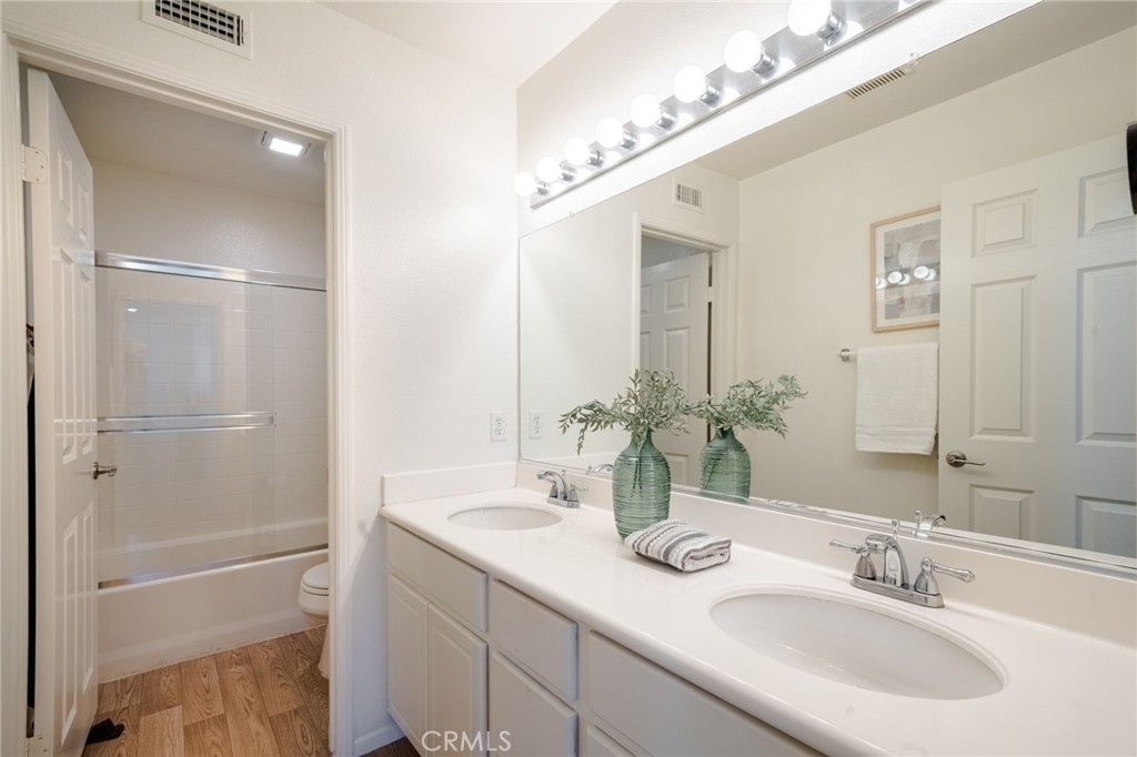 Shared Bathroom #2. Dual Sinks Basin. - 9 Calle Rosado, Mission Viejo CA 92692 - photo 37