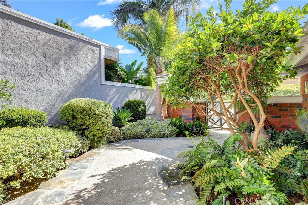 Courtyard has glass and iron gate - 1 Saint Tropez, Newport Beach CA 92660 - photo 7