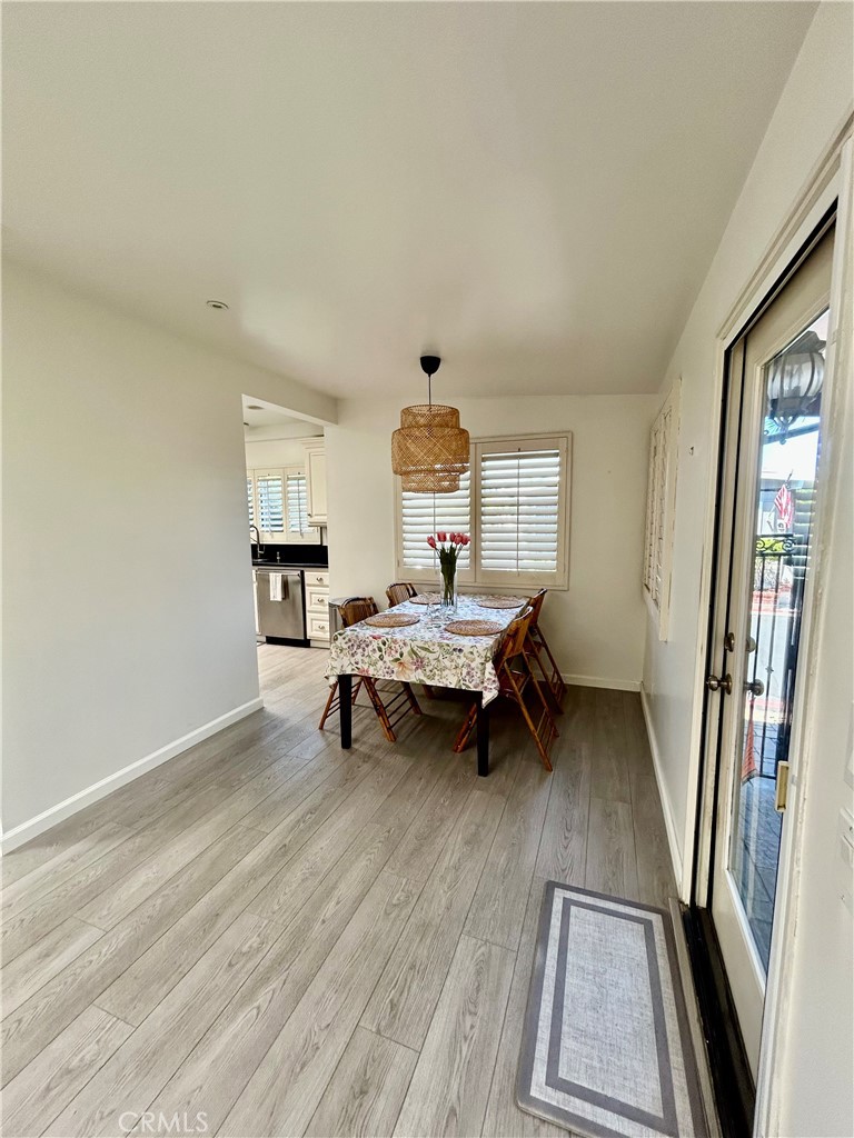 Living room and dining area - 103 Yorktown, Newport Beach CA 92660 - photo 27
