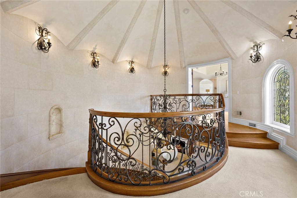 Top of stairs leading to the primary bedroom suite - 108 Kings Place, Newport Beach CA 92663 - photo 21
