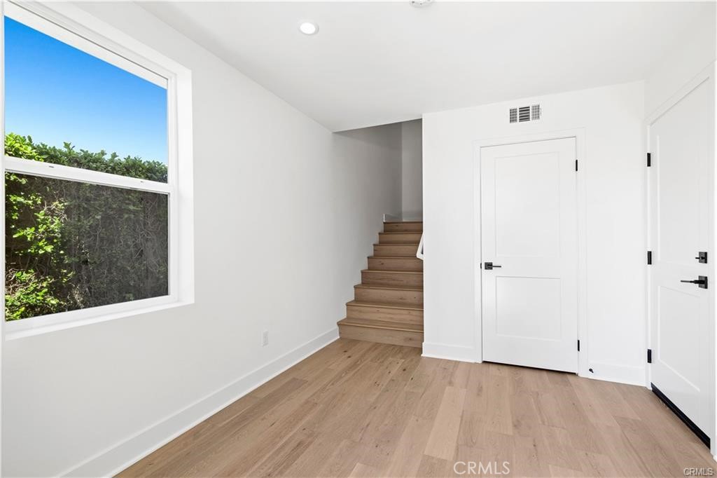 1st floor spacious entry with a door for direct access to the garage, and a large storage closet. - 1171 Winslow Lane, Newport Beach CA 92660 - photo 3