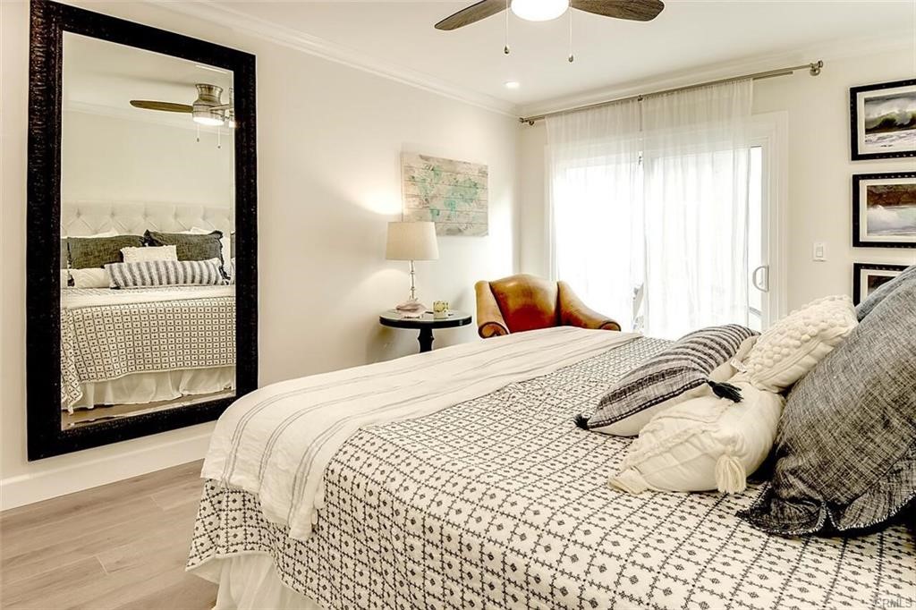Master bedroom with walk-out patio - 1184 Rutland Rd Unit 3, Newport Beach CA 92660 - photo 4