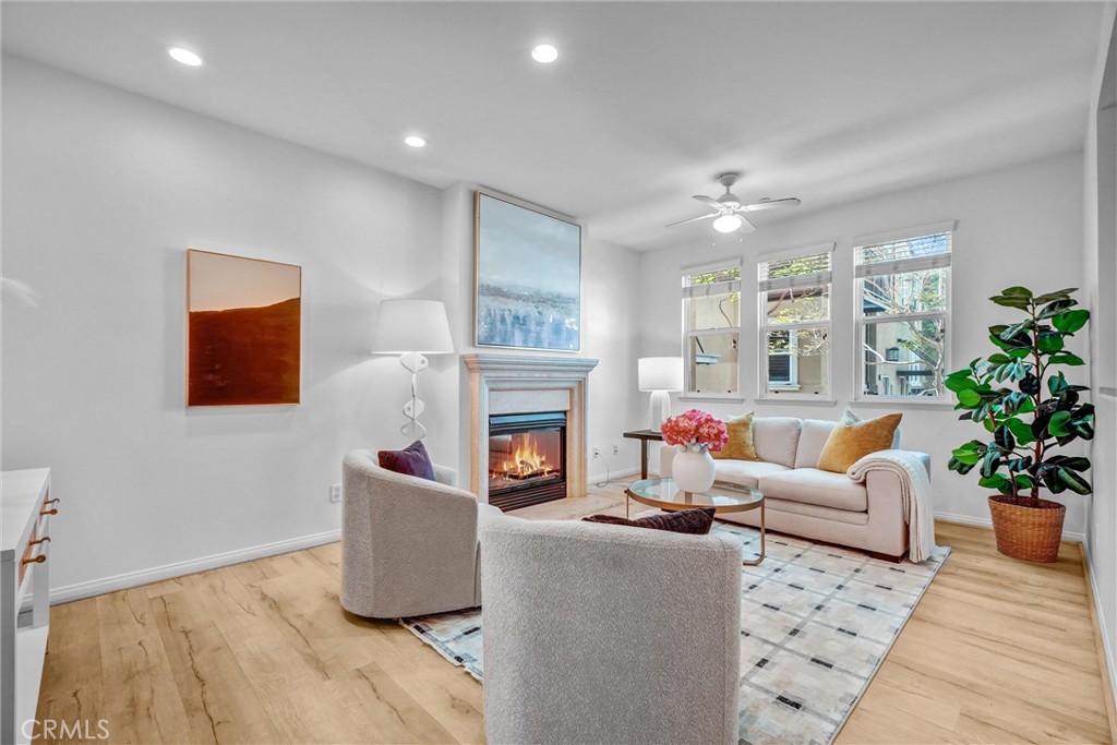 Second Floor Living Area with fireplace - 12 Shellprint Court, Newport Beach CA 92663 - photo 8