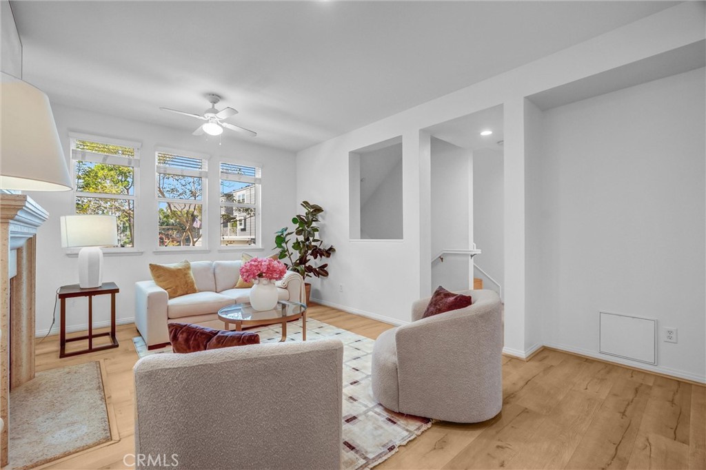 Spacious Living Area with Ceiling Fan and recessed lighting - 12 Shellprint Court, Newport Beach CA 92663 - photo 9