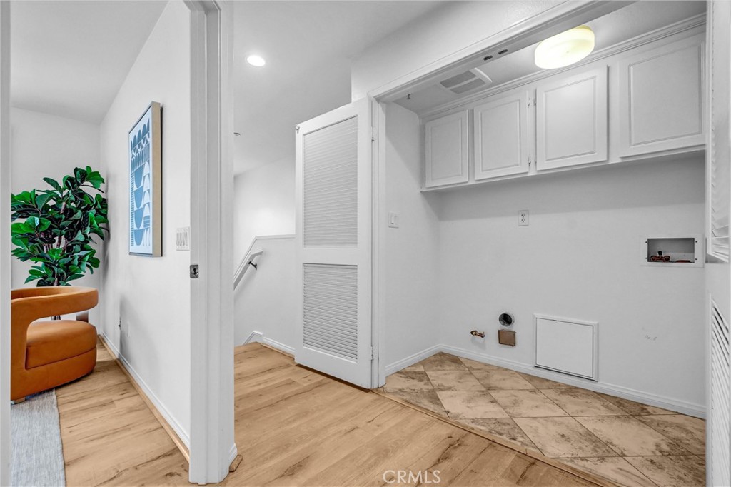 Laundry Closet on Third Level with Bedrooms - 12 Shellprint Court, Newport Beach CA 92663 - photo 20