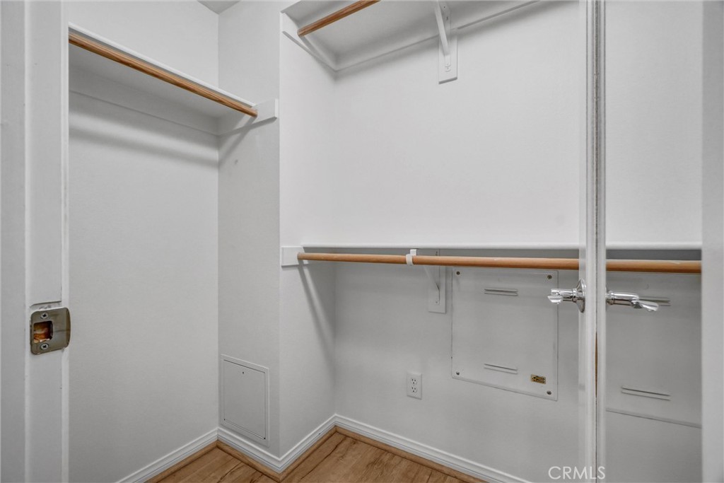 Walk-in Closet in Primary Bedroom - 12 Shellprint Court, Newport Beach CA 92663 - photo 25