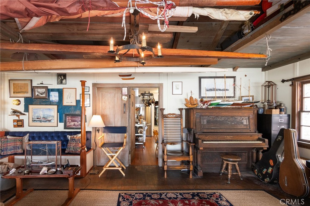 Livingroom with wood burning fireplace - 1207 N Bay Front, Newport Beach CA 92662 - photo 8