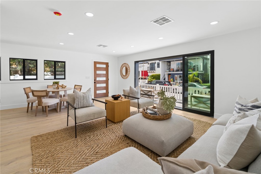 Living/Dining Space of Front Unit - 121 Marine Avenue, Newport Beach CA 92662 - photo 5