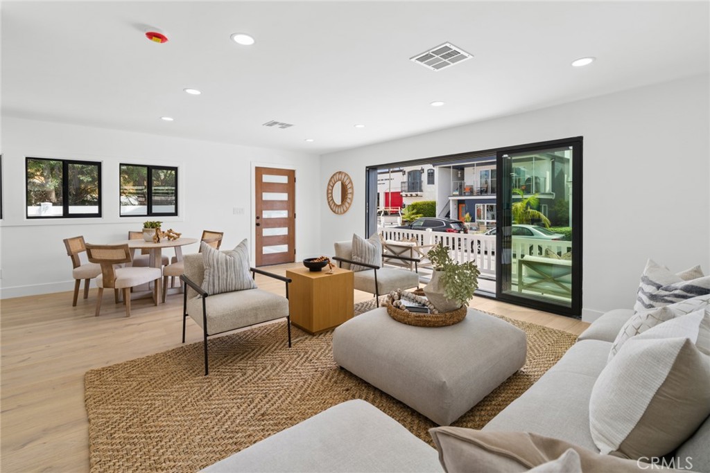 Living/Dining Space of Front Unit - 121 Marine Avenue, Newport Beach CA 92662 - photo 5