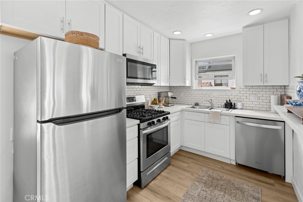 Kitchen of rear Unit - 121 Marine Avenue, Newport Beach CA 92662 - photo 21