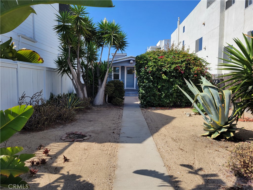 View of front yard from fence line at W. Balboa Blvd. - 1245 W Balboa Boulevard, Newport Beach CA 92661 - photo 17