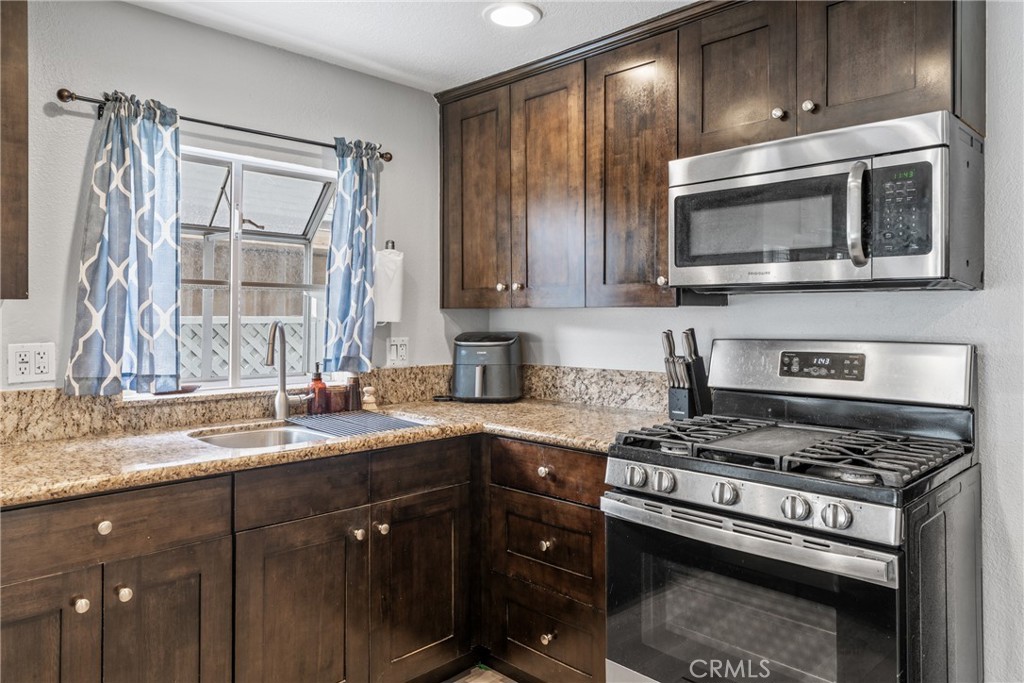 Kitchen with granite counter tops - 126 E Balboa, Newport Beach CA 92661 - photo 9