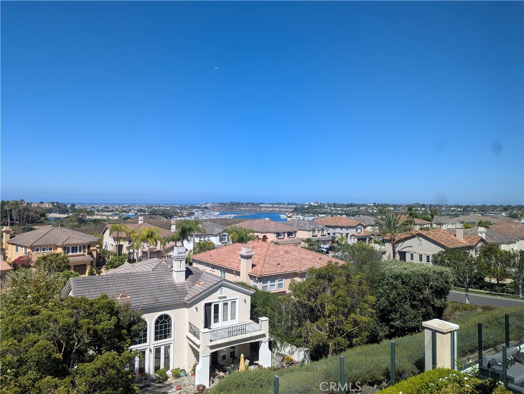 Sweeping views across the Upper Newport Bay, Newport Harbor and the Pacific Ocean. - 1402 Sea Ridge Drive, Newport Beach CA 92660 - photo 2