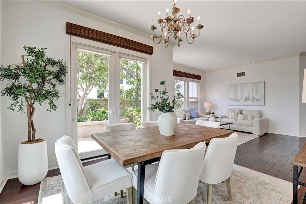 The dining area flows gracefully into the elegant living room, creating an inviting space for entertaining. - 1402 Sea Ridge Drive, Newport Beach CA 92660 - photo 14