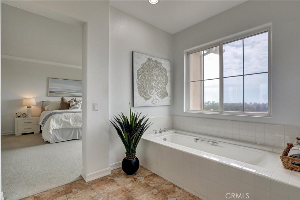 Even the primary bathroom enjoys breathtaking panoramic views of the Upper Newport Bay, Newport Harbor, and the Pacific - 1402 Sea Ridge Drive, Newport Beach CA 92660 - photo 27