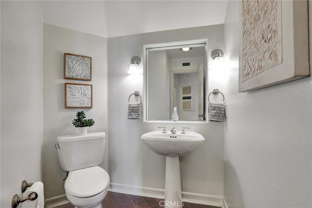 A conveniently located guest powder room serves the main living areas. - 1402 Sea Ridge Drive, Newport Beach CA 92660 - photo 34