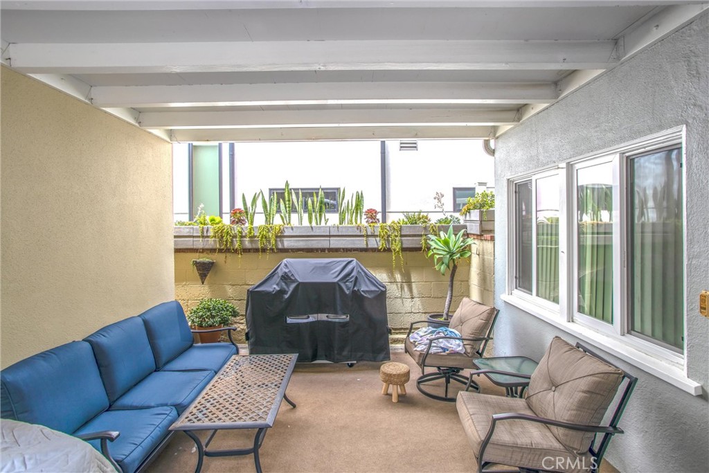 Unit 2 covered patio area - 1408 W Oceanfront, Newport Beach CA 92661 - photo 12